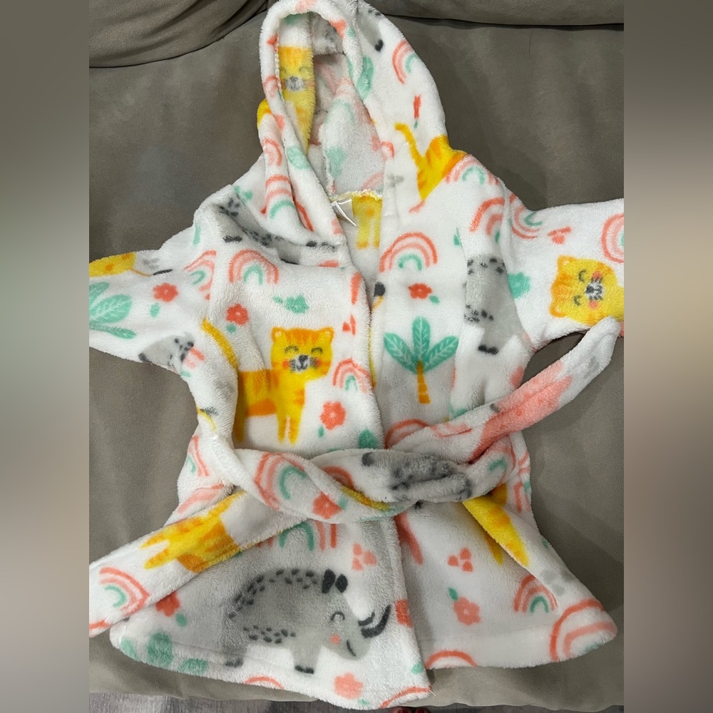 Fluffy rainbow infant robe.